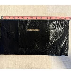 Micheal’s kors elegant big over sized clutch purse black & gold mint condition